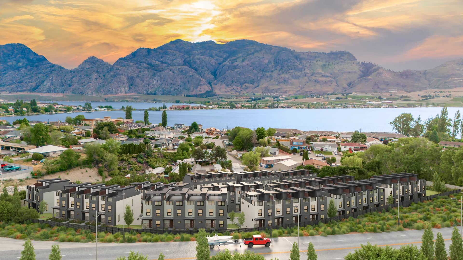 Aerial 3D render of a townhouse community composited over drone photography of the lake and hills