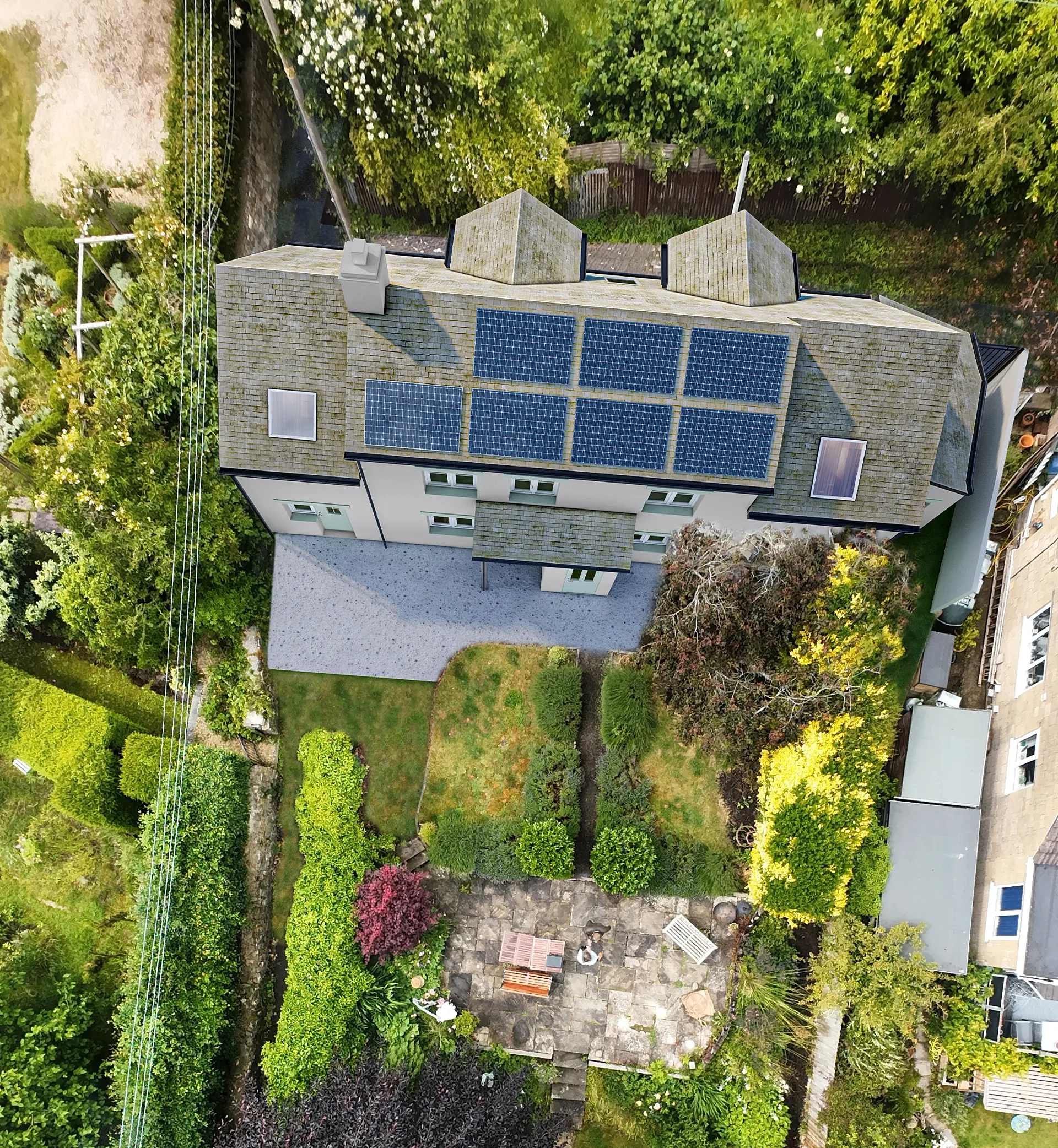 Drone-photo photomontage over the rear of a house extension